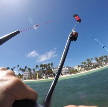 Learning how to body drag during a kitesurfing lesson